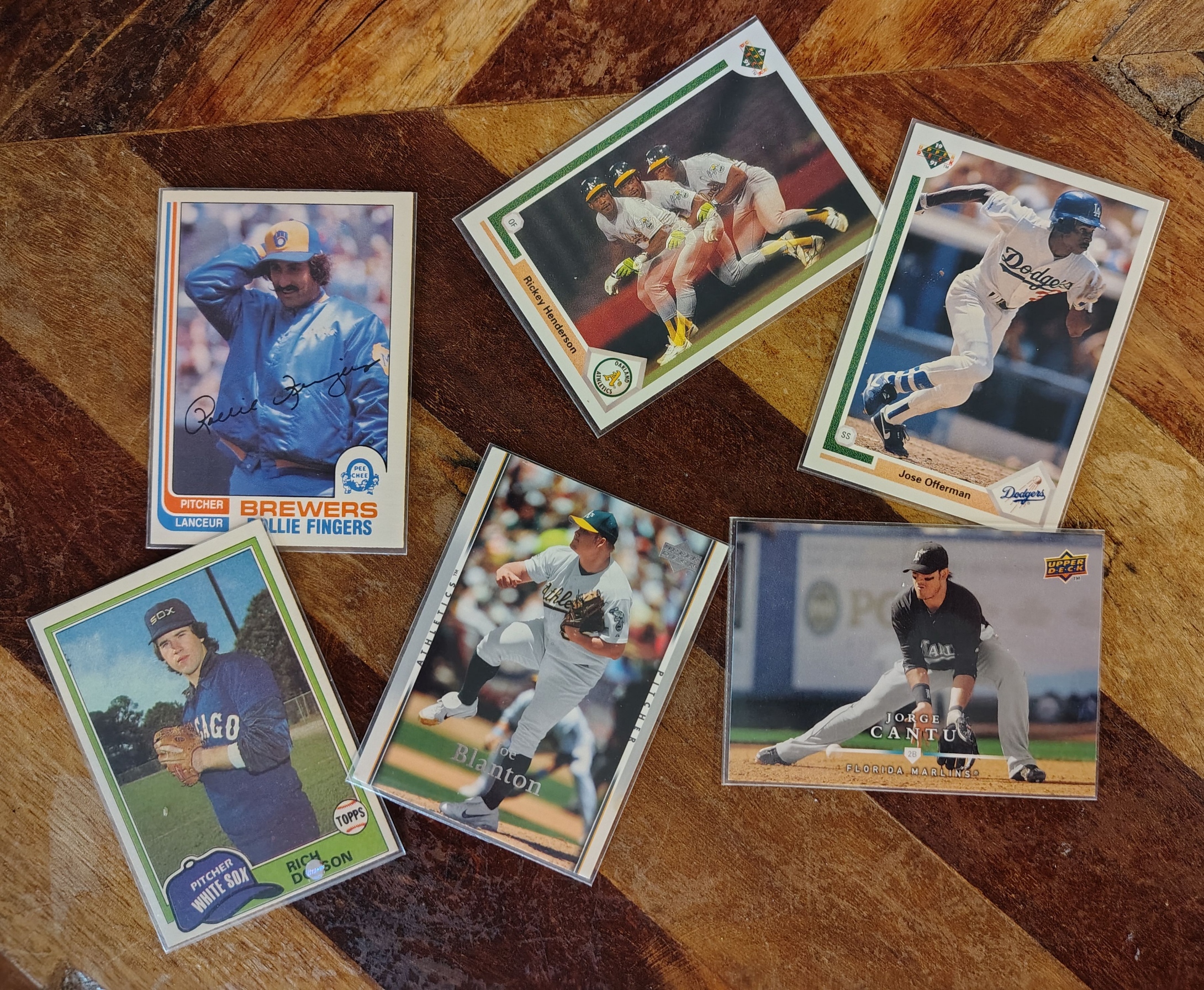 Example showing a mix of high-ranked (9-10) and low-ranked (1-3) player cards to illustrate the salary cap system